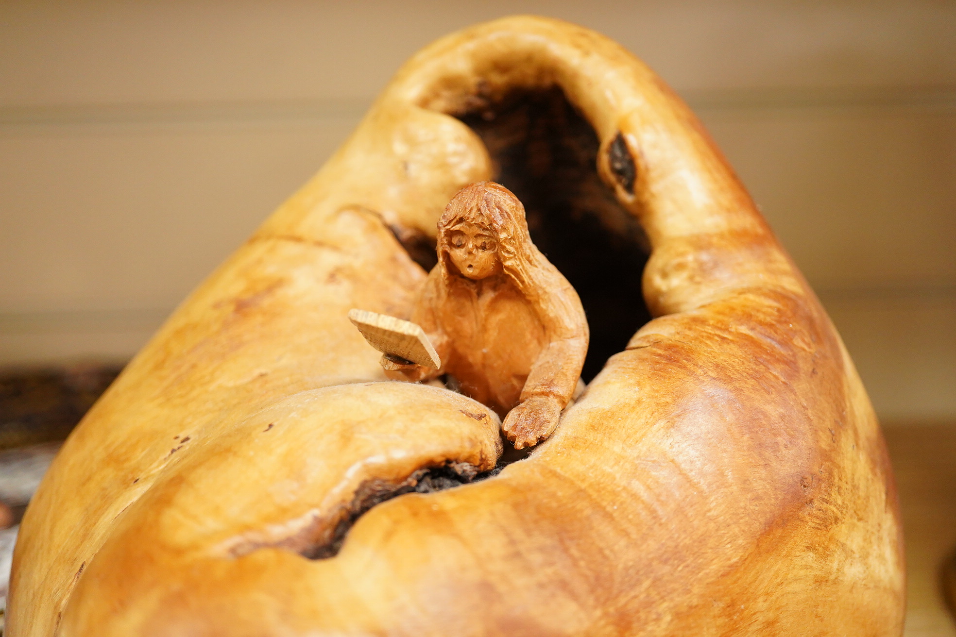 Pierre Decorse (b.1953), a large naturalistically modelled wooden sculpture depicting a figure emanating from a shell-like surround, 22cm high